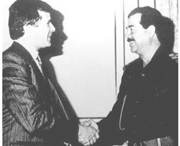 Carlos Cardoen junto a Saddam Hussein